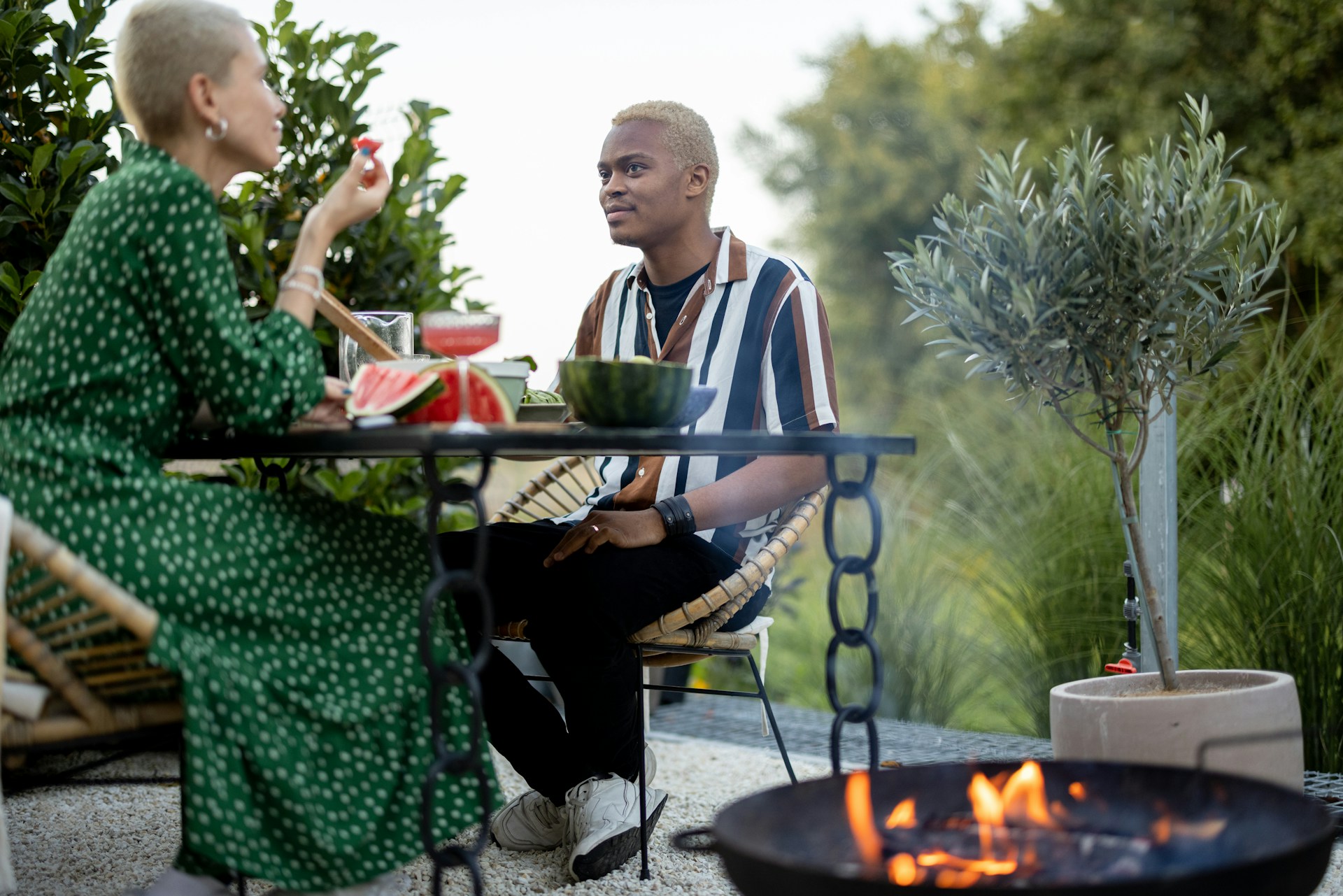 Friends sharing a meal outdoors